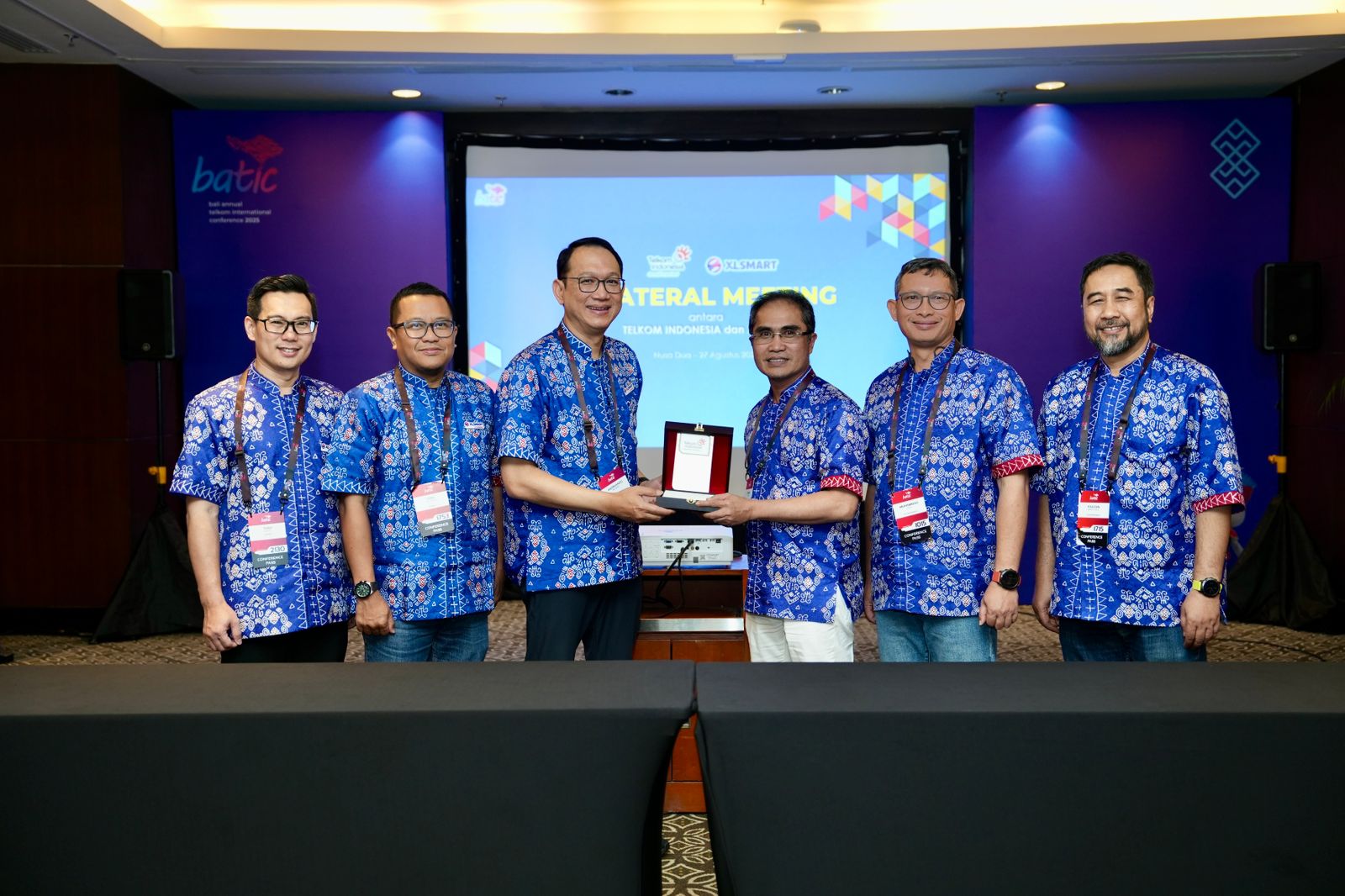 XLSMART dan Telkom Tandatangani Kerja Sama Strategis di BATIC 2025